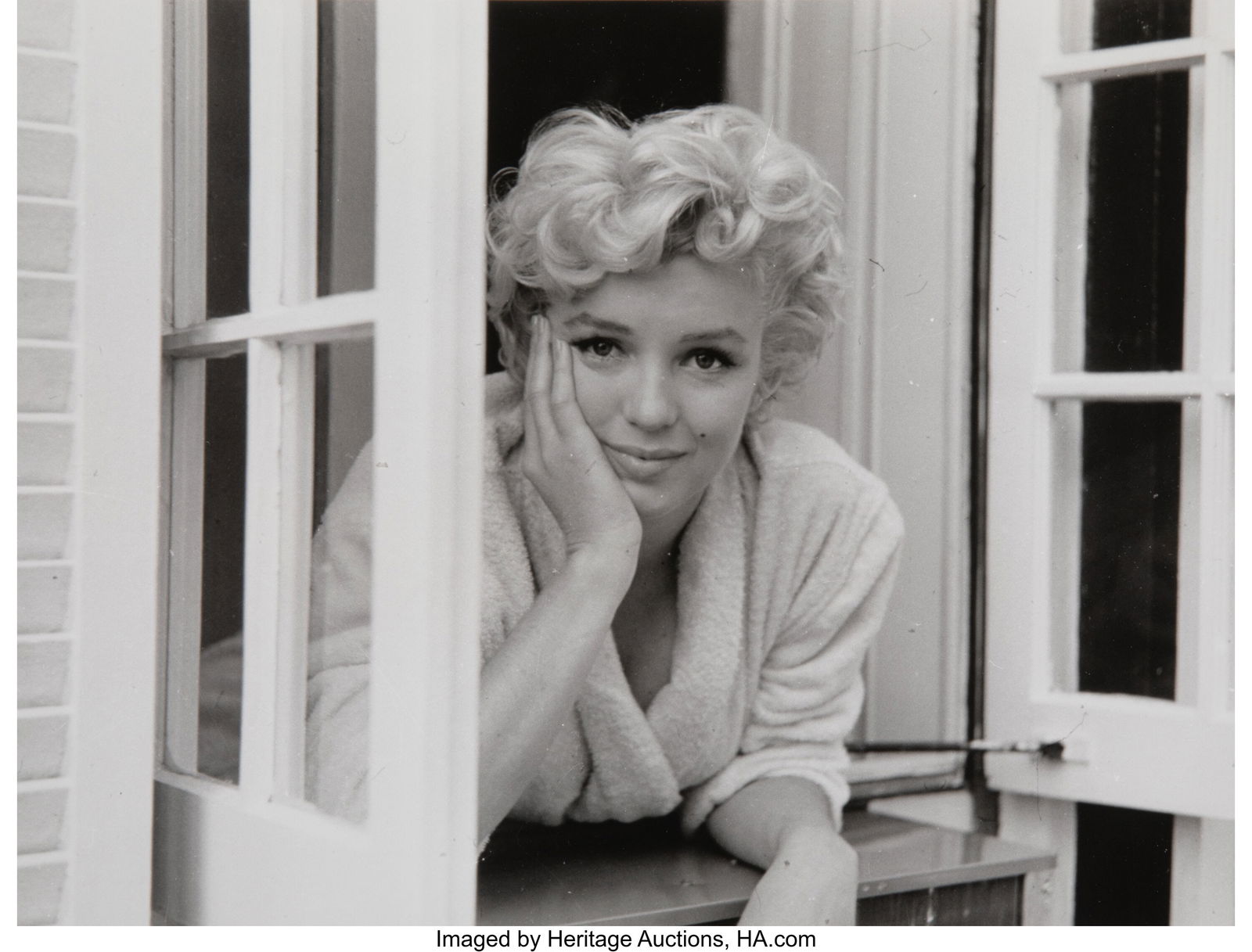 Sam Shaw (American, 1912-1999) Marilyn Monroe on: Sam Shaw (American, 1912-1999) Marilyn Monroe on a Window Sill, 1954 Gelatin silver print, printed later 10-1/4 x 13-1/2 inches (26.0 x 34.3 cm&r