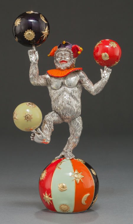 A TIFFANY & CO. SILVER AND ENAMEL JUGGLING CIRCU: A TIFFANY & CO. SILVER AND ENAMEL JUGGLING CIRCUS MONKEY ON BALL DESIGNED BY GENE MOORE <