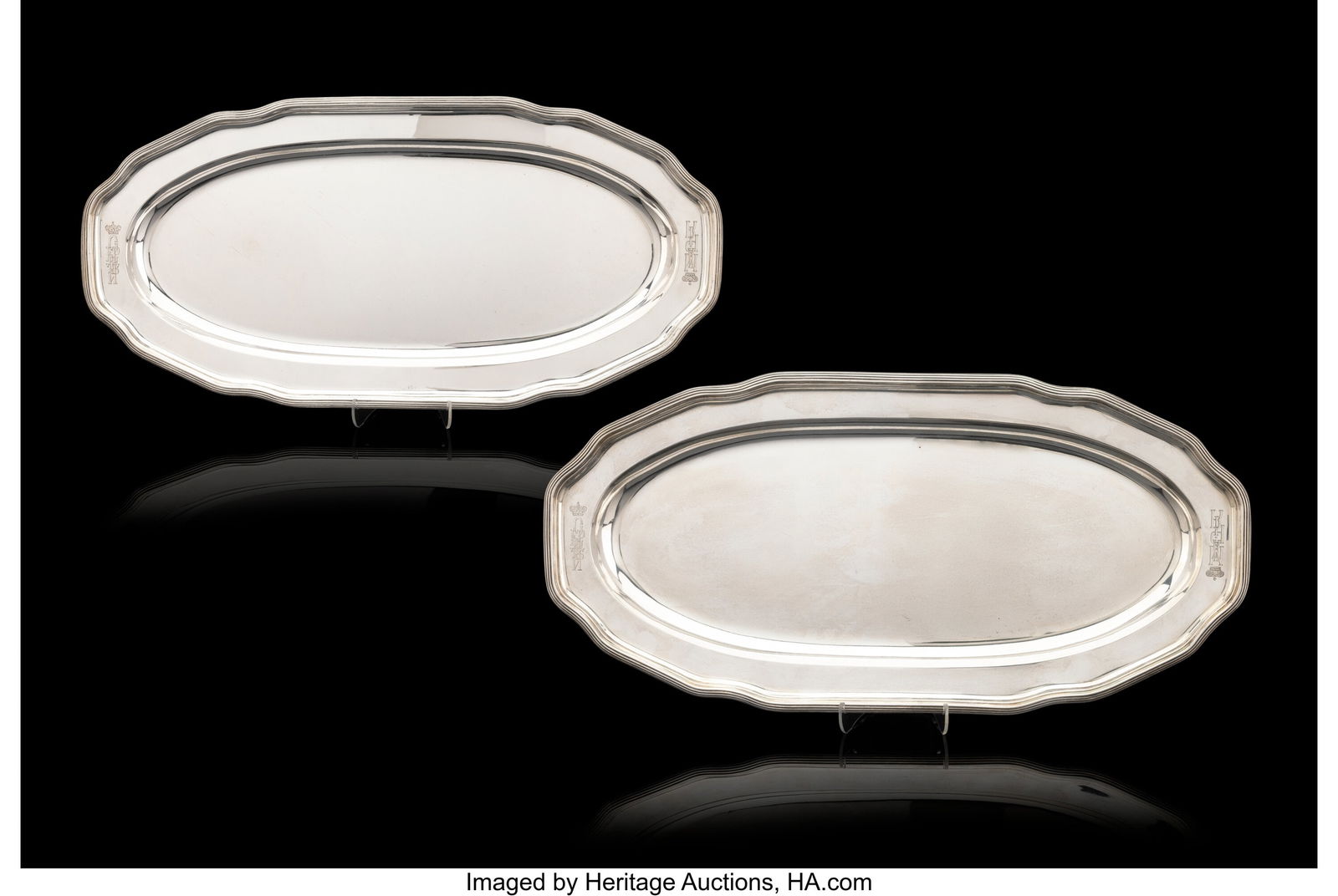 A Pair of Russian Imperial Silver Service Trays: A Pair of Russian Imperial Silver Service Trays Grachev Brothers, St. Petersburg, circa 1884 22 x 10-1/2 inches (55.9 x 26.7 cm) (each) 3988 gr