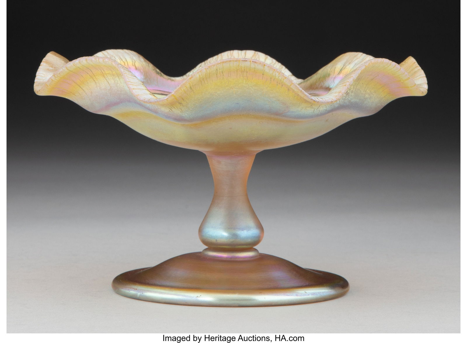 Tiffany Studios Compote, circa 1910 USA Favrile: Tiffany Studios Compote, circa 1910 USA Favrile glass 3-3/4 x 6-1/4 inches (9.5 x 15.9 cm) Marks: L.C.T. HID03101062020 © 2024 Her