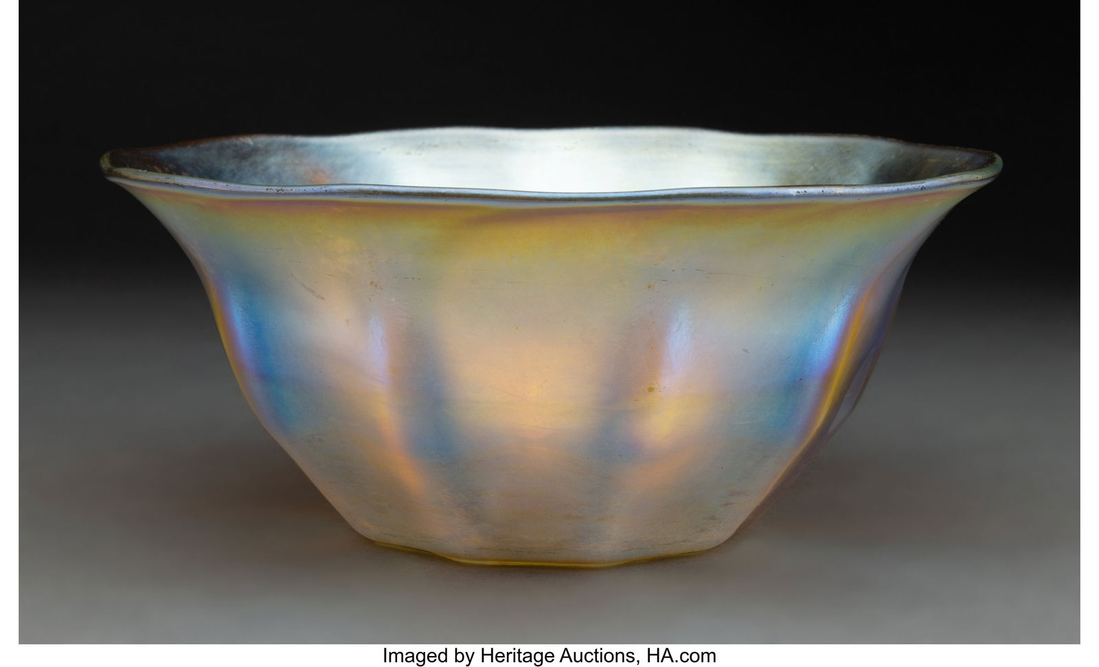 Tiffany Studios Bowl, circa 1910 USA Favrile gla: Tiffany Studios Bowl, circa 1910 USA Favrile glass 3-1/2 x 8-1/8 inches (8.9 x 20.6 cm) Marks: L.C. Tiffany-Inc, Favrile HID03101062020
