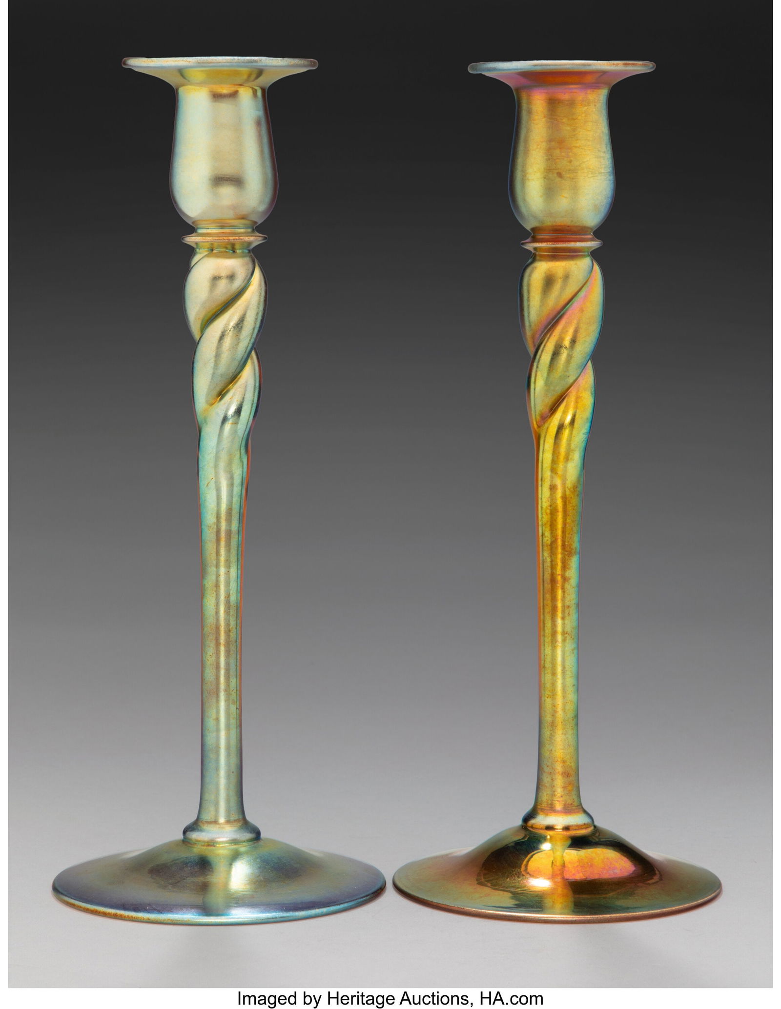 Steuben Glass Works Pair of Candlesticks, circa: Steuben Glass Works Pair of Candlesticks, circa 1910 USA Gold Aurene glass 12 x 4-3/4 inches (30.5 x 12.1 cm) (each) Marks: aurene, 686 Property