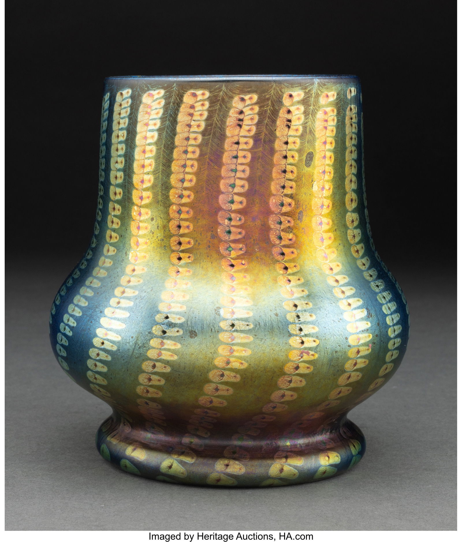 Tiffany Studios Zipper Vase, circa 1910 USA Deco: Tiffany Studios Zipper Vase, circa 1910 USA Decorated Favrile glass 5-5/8 inches (14.3 cm) Marks: L.C.T. K1493 HID03101062020 © 2024 Heritage