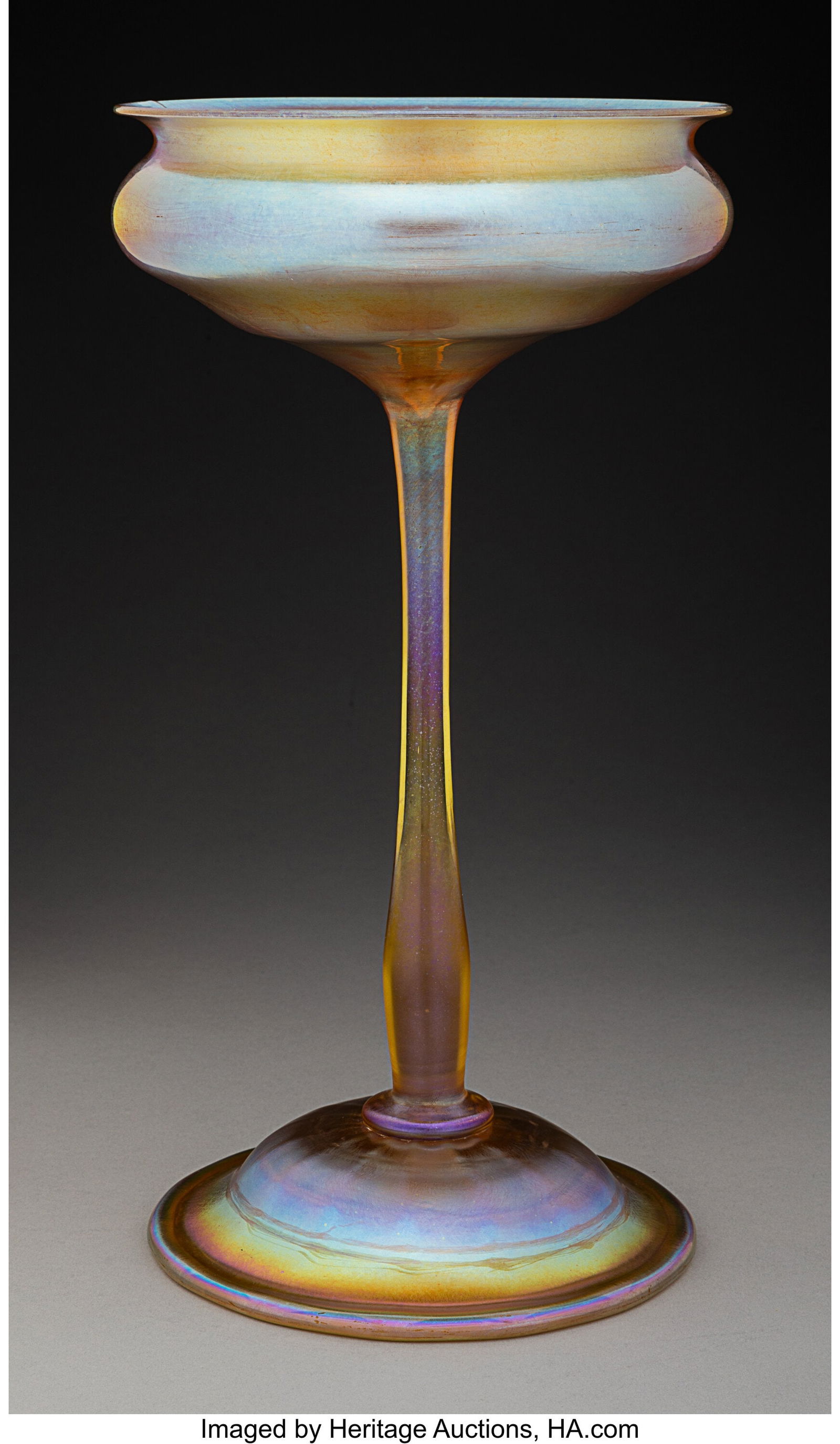Tiffany Studios Stemmed Vase, circa 1910 USA Fav: Tiffany Studios Stemmed Vase, circa 1910 USA Favrile glass 11 x 6 inches (27.9 x 15.2 cm) Marks: L.C.T. Property from A.C. Morgan