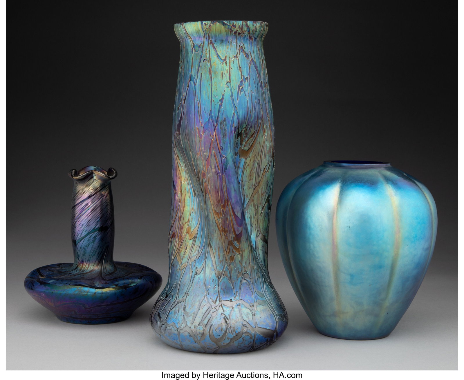 Bohemian Three Vases, circa 1900 Iridescent gla: Bohemian Three Vases, circa 1900 Iridescent glass 12-1/4 inches (31.1 cm) (tallest, Rindskopf) The lot comprising: 1 Rindskopf Crackle vase; 1 Hec