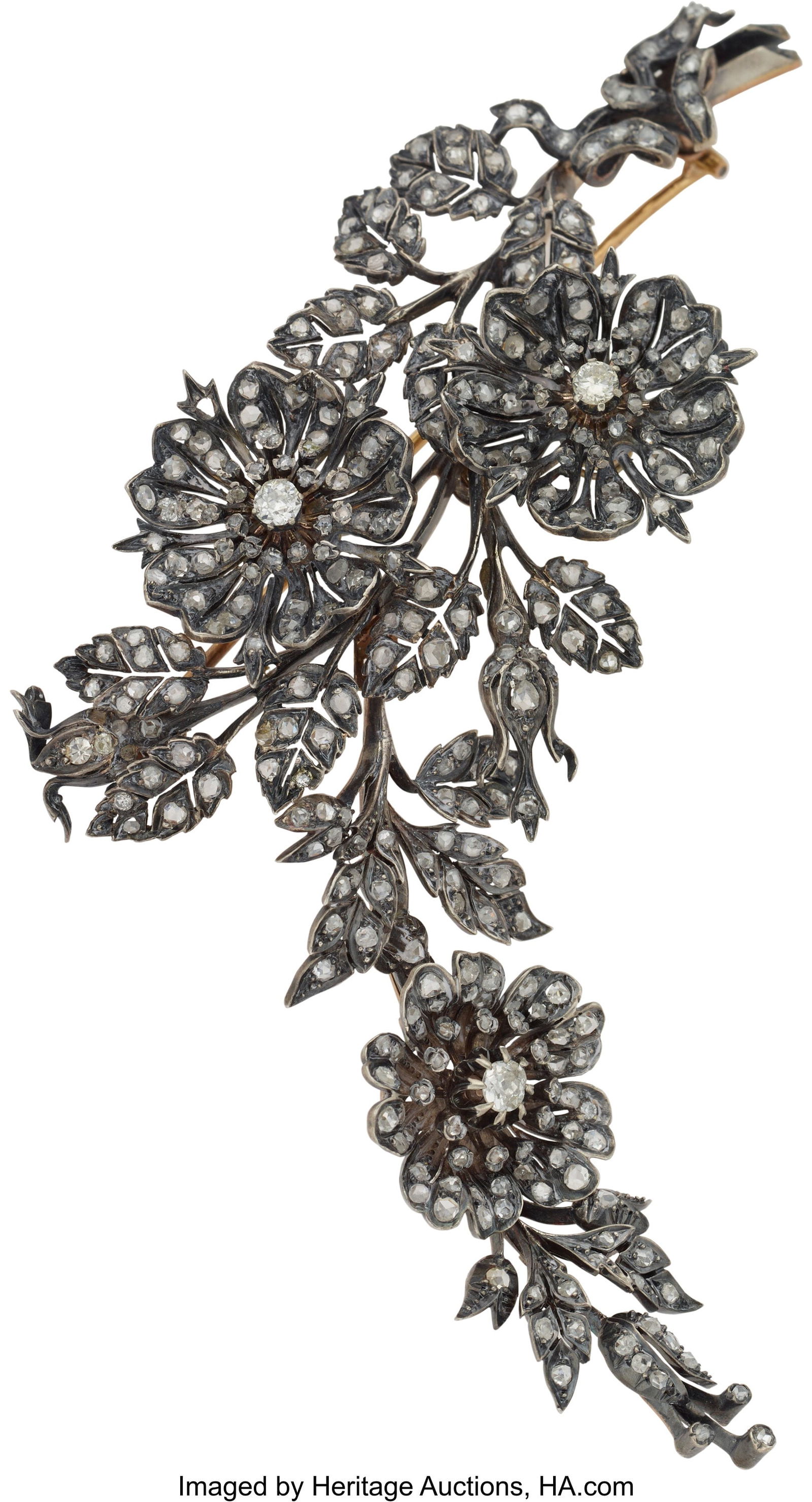 A Diamond-Set Silver-Topped Gold Floral En Tremb: A Diamond-Set Silver-Topped Gold Floral En Tremblant Spray Brooch Marks: (swan), (owl) 5-1/2 x 1-3/4 x 0-3/4 inches (14.0 x 4.4 x 1&perio