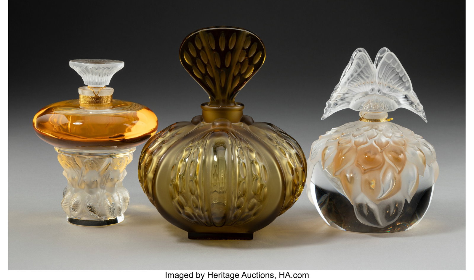 Lalique Three Perfume Bottles, post-1945 France: Lalique Three Perfume Bottles, post-1945 France Frosted glass 5-1/2 x 4-1/2 inches (14.0 x 11.4 cm) (tallest, Maribel) Marks: Lalique France