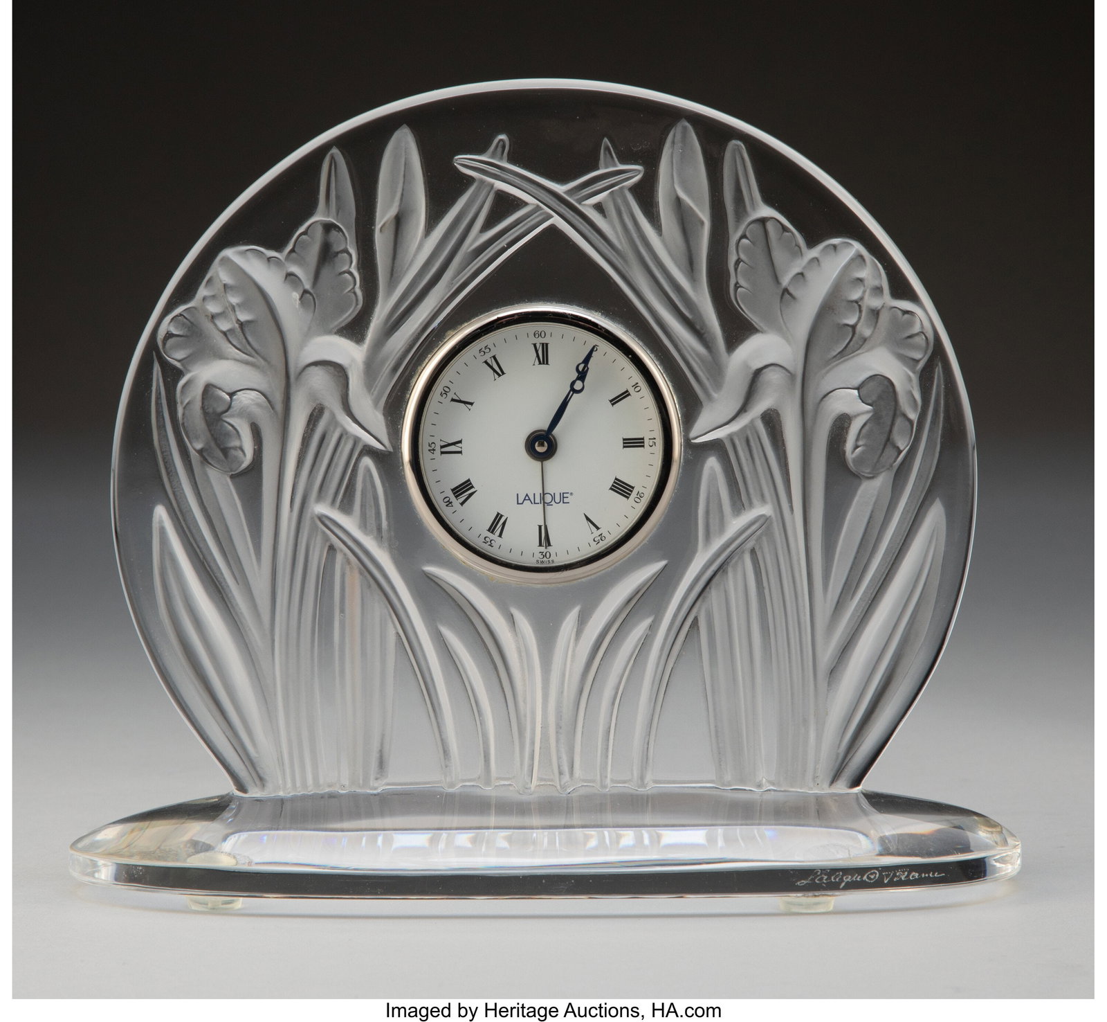 Lalique Iris Clock, post-1945 France Clear and f: Lalique Iris Clock, post-1945 France Clear and frosted glass 7 x 8 inches (17.8 x 20.3 cm) Mark to glass: Lalique, France Marks to clockface: LALIQUE Pr