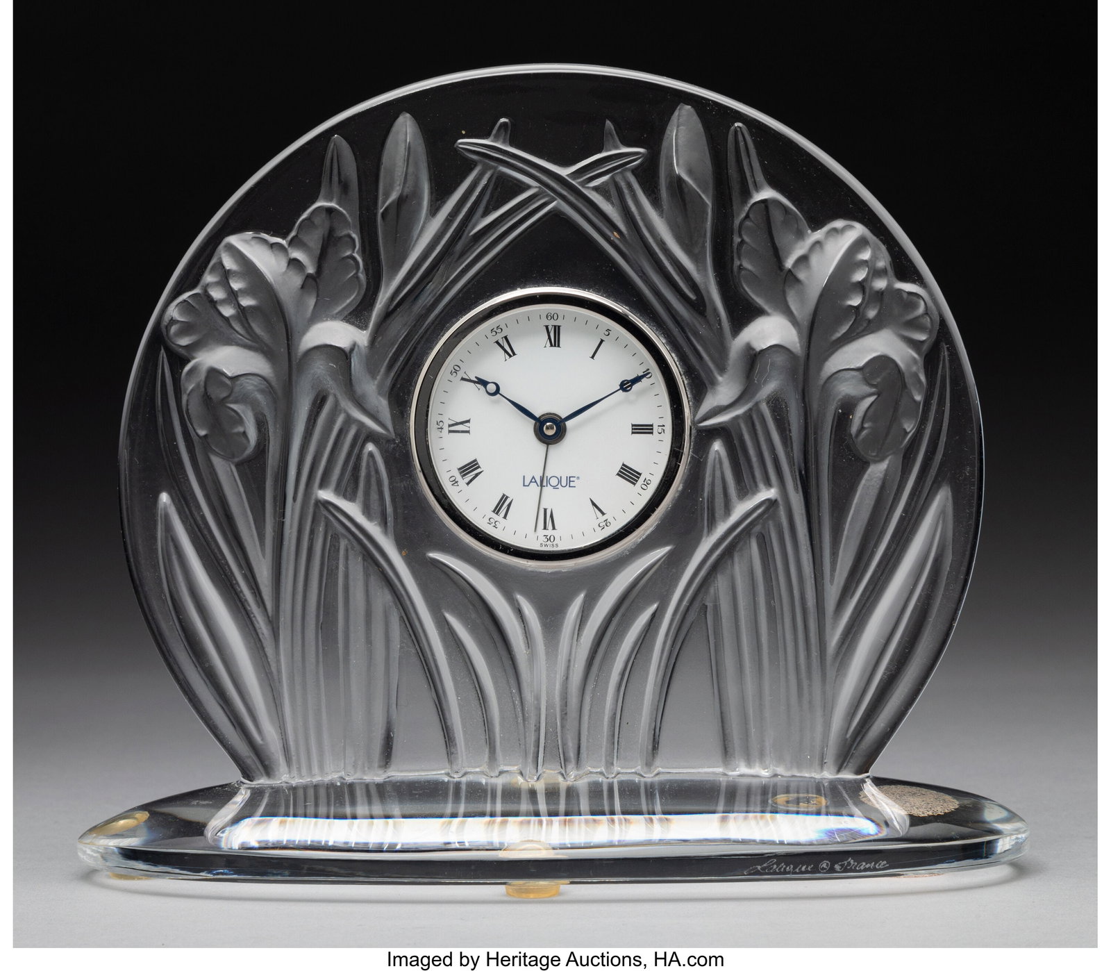 Lalique Iris Clock, post-1945 France Clear and f: Lalique Iris Clock, post-1945 France Clear and frosted glass 6-7/8 x 8 x 3-1/2 inches (17.5 x 20.3 x 8.9 cm) Marks: Lalique France Property from a Pr