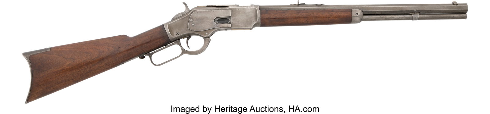Winchester Model 1873 Lever Action Rifle. Seri: Winchester Model 1873 Lever Action Rifle. Serial no. 123975A [lower tang], .32 caliber,18-inch octagonal barrel with fixed front sight and rear adjustable 