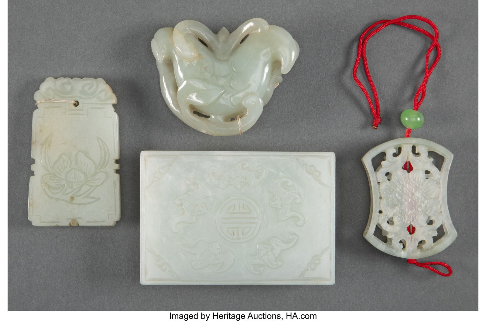 A Group of Four Chinese Jade Articles 2-1/8 x 3- (1 of 2)