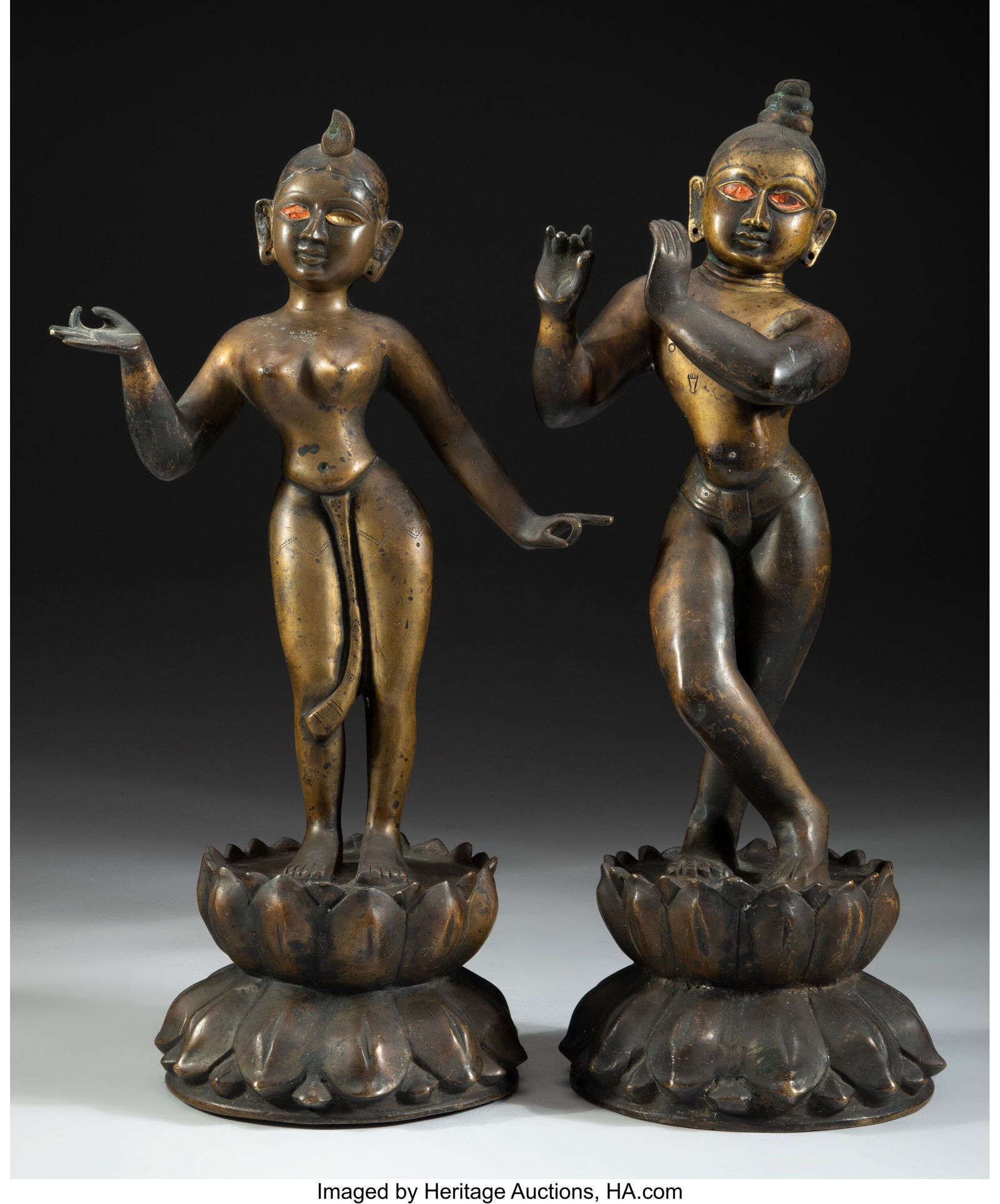 A Pair of Indian Bronze Figures: Krishna and Rad (1 of 2)
