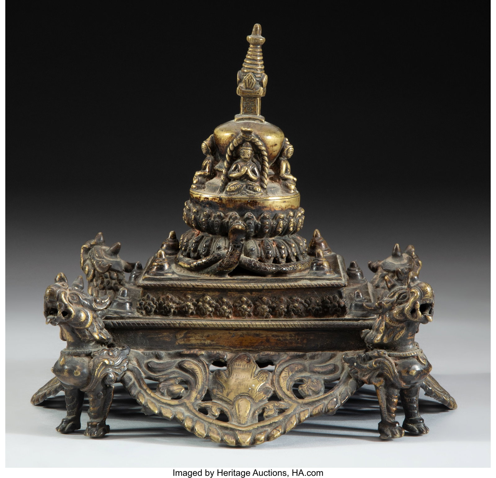 A Nepalese Bronze Stupa with Naga, 20th century : A Nepalese Bronze Stupa with Naga, 20th century 8 x 8-1/2 x 8-1/2 inches (20.3 x 21.6 x 21.6 cm) Property from the Private Collection of Dr. John Ro