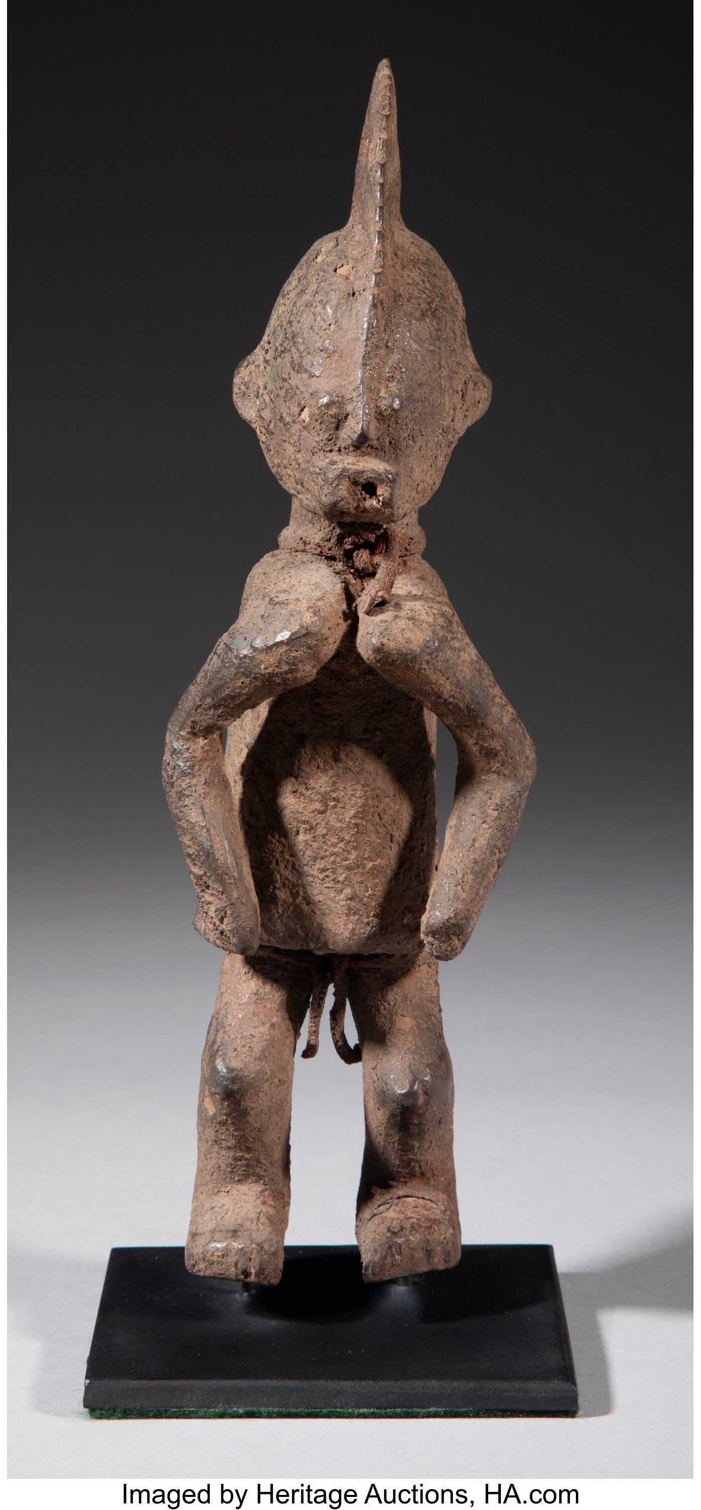 A Chamba Figure Attributed to the artist "Soo: A Chamba Figure Attributed to the artist "Soomba" (active 1920s-1940s), Cross River Region, Nigeria Wood with an encrusted surface from libations and use as a devotional object&p