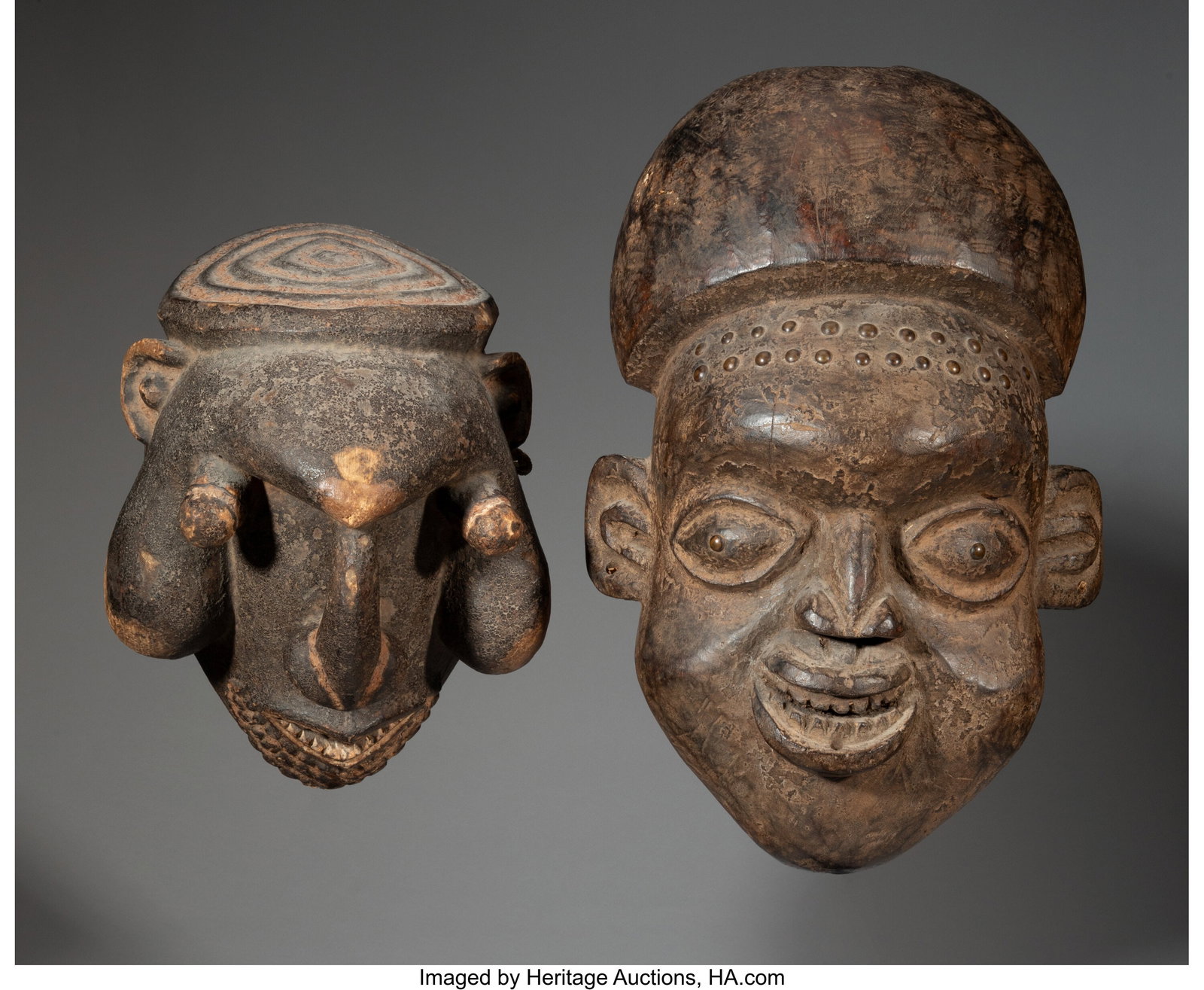 Two Cameroon Masks Provenance: Property fro: Two Cameroon Masks Provenance: Property from the Private Collection of Dr. John Ross, Sr. Heights: 10 and 18 &frac12; inches HID03101062020 © 2024 Heritag