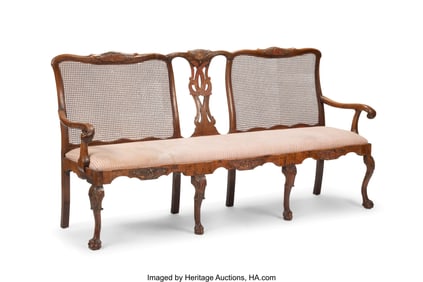 61162&colon; A Portuguese Carved Wood Upholstered and Caned S