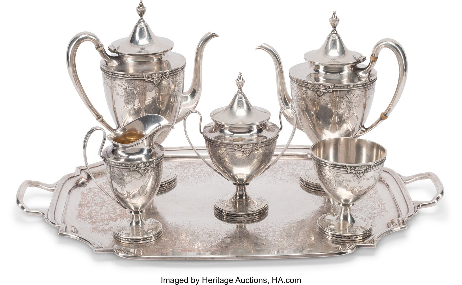 A Five-Piece Shreve & Co. Silver Tea Set with a: A Five-Piece Shreve & Co. Silver Tea Set with a Married Silver-Plated Tray Marks to one: SHREVE & CO, SAN FRANCISCO, STERLING, 8475, 2 PINTS 11 x 23 x 15-1/2 inches (27.9 x 58.4 x 39.4 cm) (overall) H