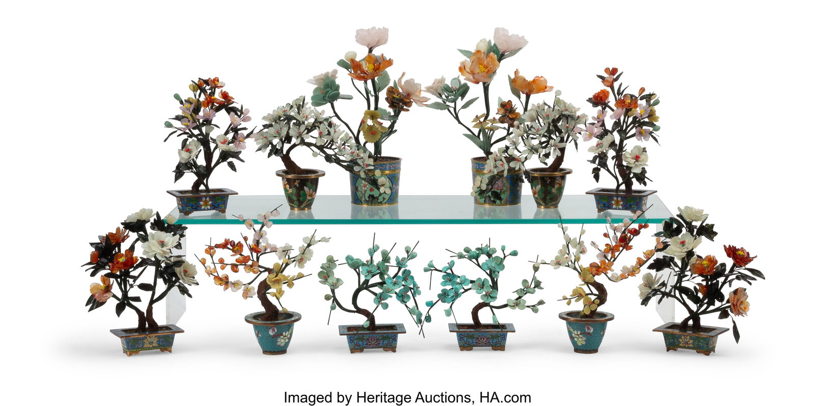 A Collection of Six Pairs of Chinese Jade Trees : A Collection of Six Pairs of Chinese Jade Trees on Cloisonné Enameled Bases 12-1/2 x 10 x 5 inches (31.8 x 25.4 x 12.7 cm) HID03101062020 © 2024 Heritage