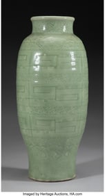 78051&colon; A Chinese Longquan Celadon-Glazed Baluster Vase&comma;