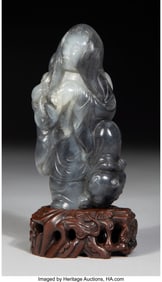 78013&colon; A Chinese Black and White Jade Figure of Liu Hai
