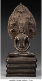 78116&colon; A Southeast Asian Bronze Buddha Sheltered by a N