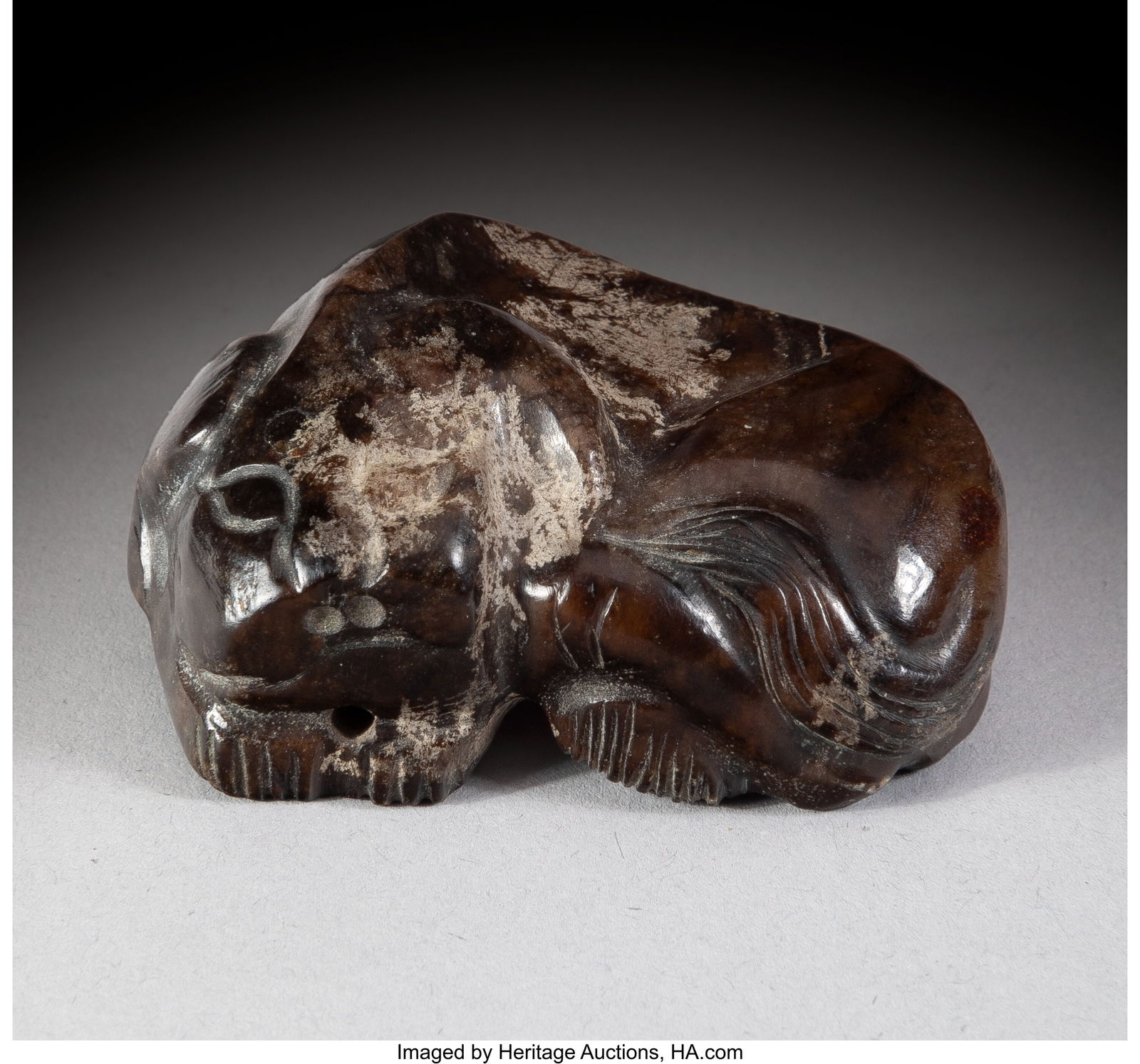 A Chinese Archaistic Jade Beast 0-3/4 x 1-3/4 x: A Chinese Archaistic Jade Beast 0-3/4 x 1-3/4 x 1-1/4 inches (1.9 x 4.4 x 3.2 cm) HID03101062020 © 2024 Heritage Auctions | All Rights Reserved www