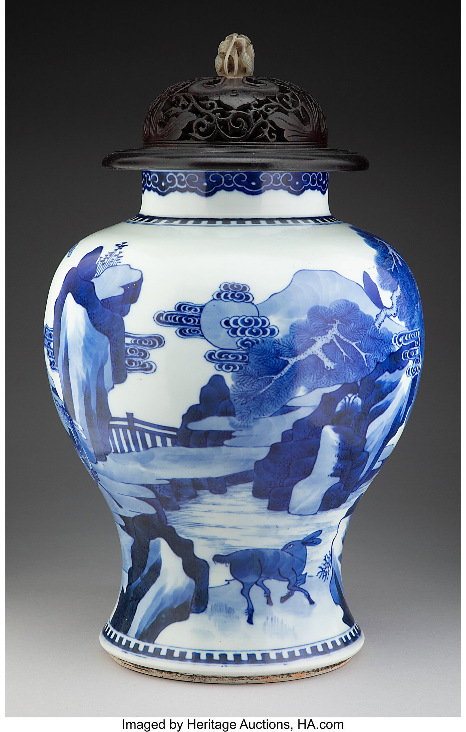 A Chinese Blue and White Covered Jar Marks: (dou: A Chinese Blue and White Covered Jar Marks: (double circle in blue underglaze) 13-1/4 x 9-1/4 x 9-1/4 inches (33.7 x 23.5 x 23.5 cm) (wo