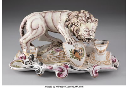 29023&colon; A Partial Gilt Faience Lion-Form Armorial Inkwel
