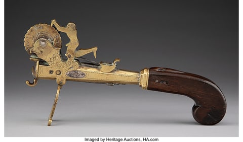 61229: A Carved Wood, Brass, and Metal Erotic Pistol-Fo