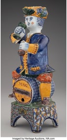 61249: A Delft Figural Wine Cistern, 18th century 14 x