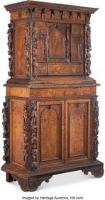 61190: An Italian Carved Walnut Bambocci, 17th century & later