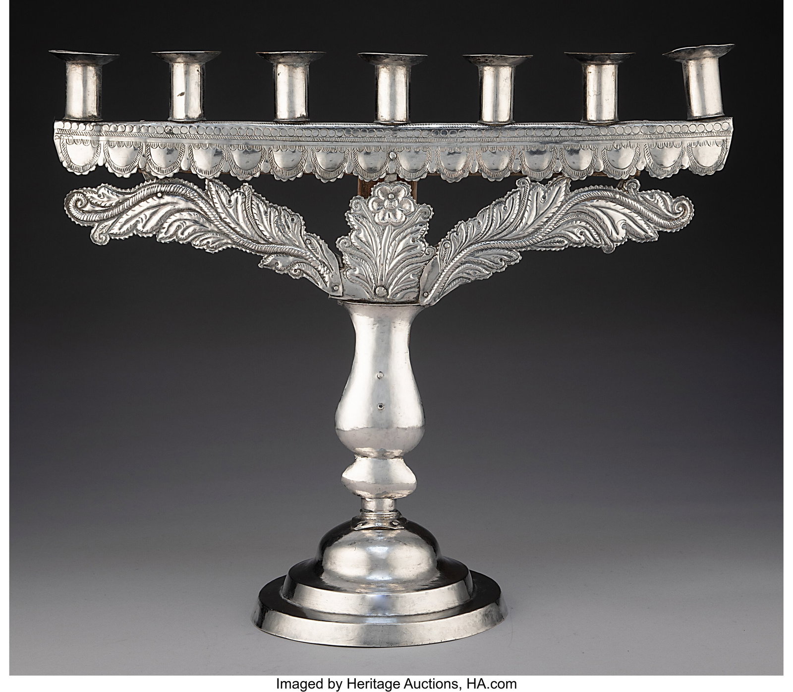 A Spanish Colonial Silver-Mounted Wood Seven-Lig: A Spanish Colonial Silver-Mounted Wood Seven-Light Candelabrum, Alto Peru (Bolivia), 18th century Marks: 159 15 x 17-1/2 x 6-1/2 inches (38.1 x 44&perio
