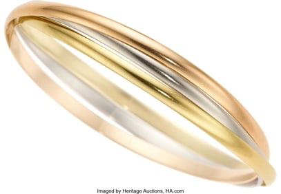 55010: Cartier Gold Bracelet  Metal: 18k white, rose an