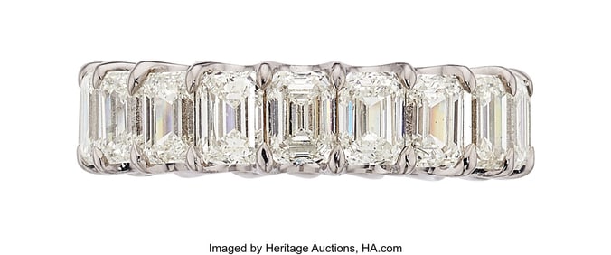 55365: Diamond, White Gold Eternity Band  Stones: Emera