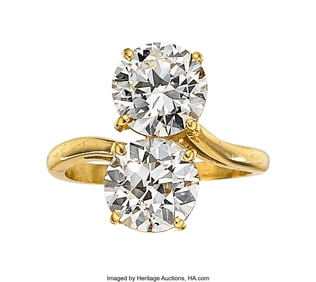 55111: Diamond, Gold Ring   Stones: Round brilliant and