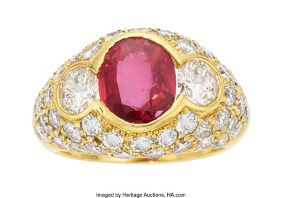 55117: Ruby, Diamond, Gold Ring  Stones: Oval-shaped ru