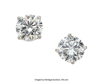 55386: Diamond, Platinum Earrings  Stones: Round brilli