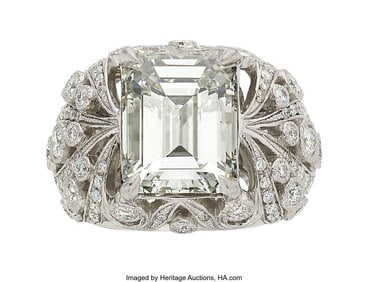 55395: Diamond, Platinum Ring  Stones: Emerald-cut diam