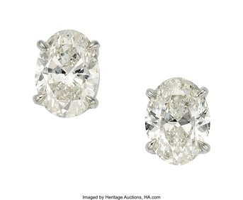 55400: Diamond, Platinum Earrings  Stones: Oval-shaped