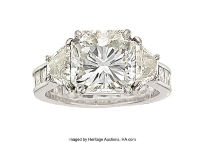 55404: Diamond, Platinum Ring  Stones: Cut-cornered squ