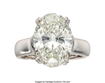 55143: Diamond, Platinum Ring  Stones: Oval-shaped diam
