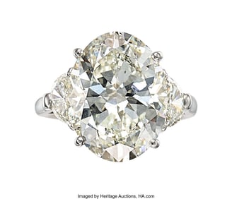 55419: Diamond, Platinum Ring  Stones: Oval-shaped diam