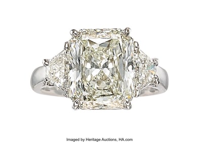 55320: Diamond, Platinum Ring  Stones: Cut-cornered rec