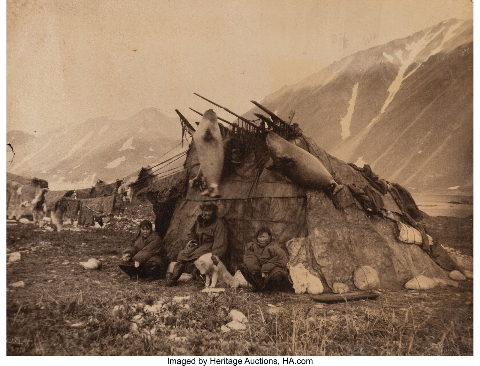 Edward Sheriff Curtis (American, 1868-1952) Inui: Edward Sheriff Curtis (American, 1868-1952) Inuit Hut and Family, circa 1921 Platinum print 13-3/4 x 17-7/8 inches (34.9 x 45.3 cm) (image&so