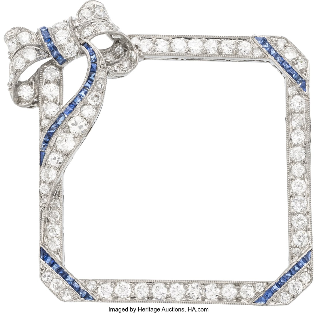 Diamond, Sapphire, Platinum, White Gold Brooch : Diamond, Sapphire, Platinum, White Gold Brooch Stones: Transitional and European-cut diamonds weighing a total of approximately 0.95 carat; calibré-cut sapph