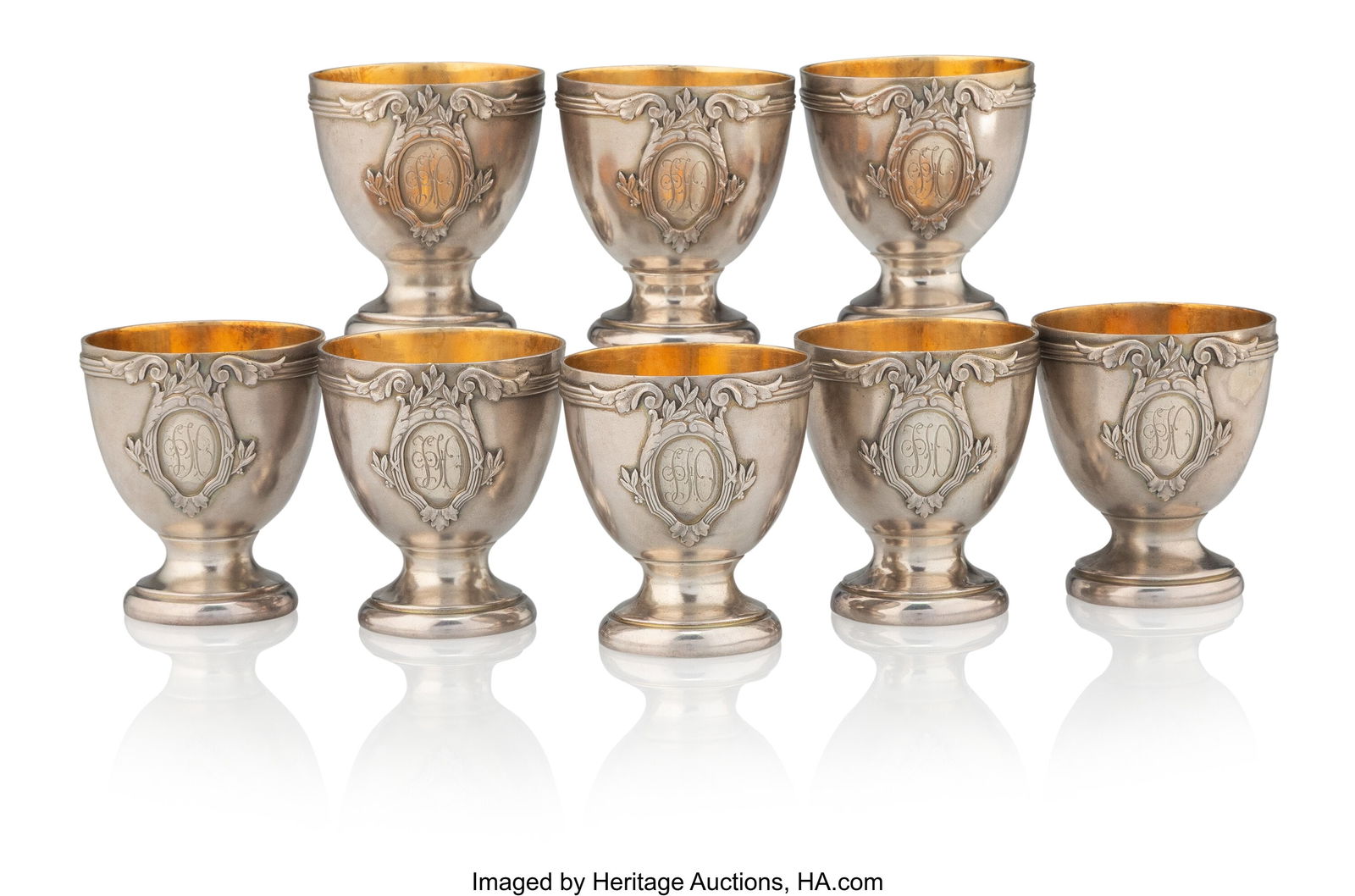 A Fabergé Set of Eight Gilt-Washed Silver Egg C: A Fabergé Set of Eight Gilt-Washed Silver Egg Cups Fabergé, Workmaster Julius Rappoport, St. Petersburg, 1908-1917 2 x 1-3/4 inches (5.1 x 4&peri