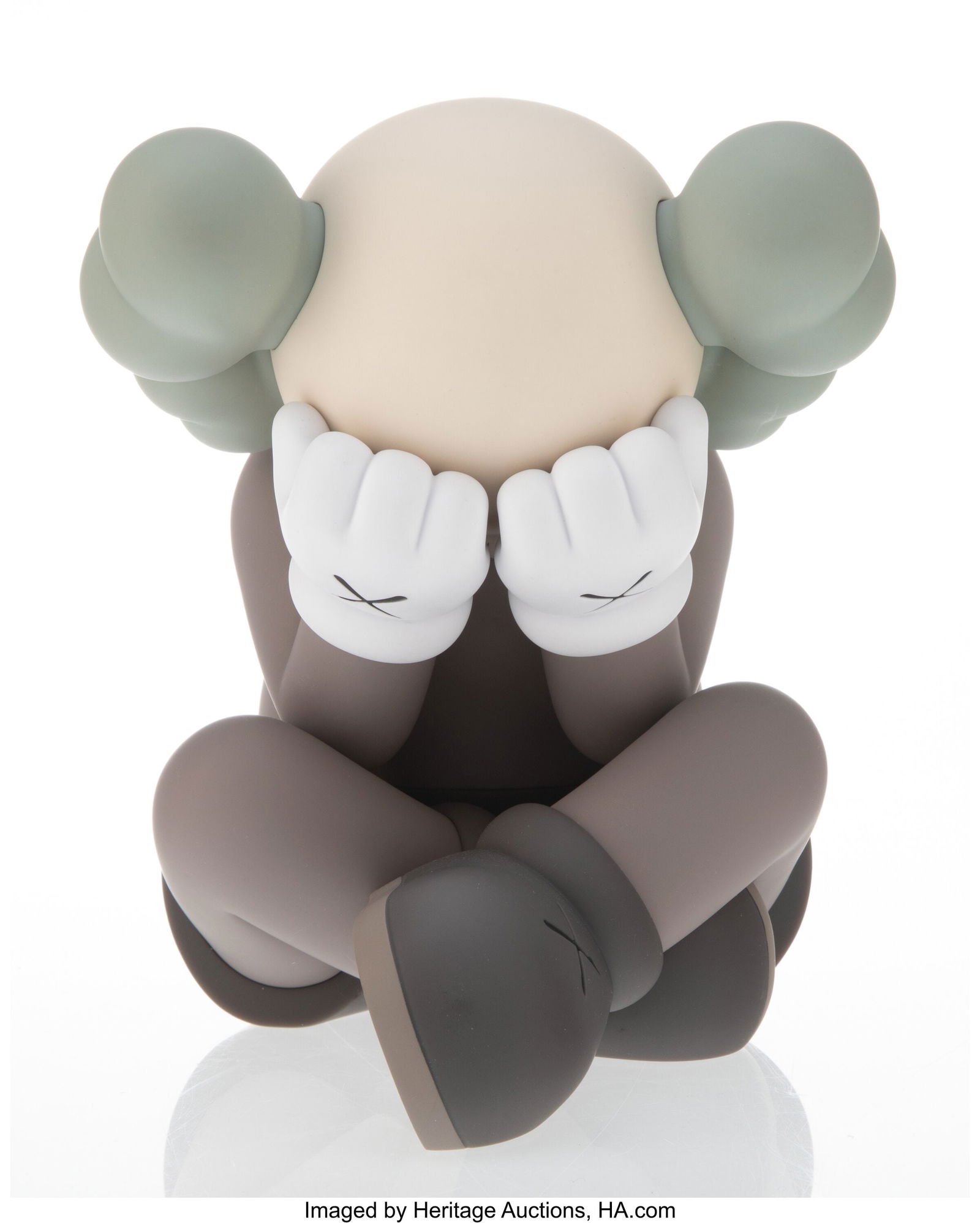 KAWS (b. 1974) Separated (Brown), 2021 Painted c: KAWS (b. 1974) Separated (Brown), 2021 Painted cast vinyl 7-3/4 x 6 x 6 inches (19.7 x 15.2 x 15.2 cm) Stamped on underside Produced