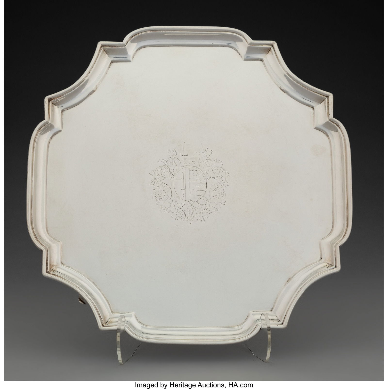 A George Wickes Silver Salver with Scroll Feet,: A George Wickes Silver Salver with Scroll Feet, London, 1729 Marks: (lion passant), (crowned leopard's head), GW, O 1-1/2 x 10 inches (
