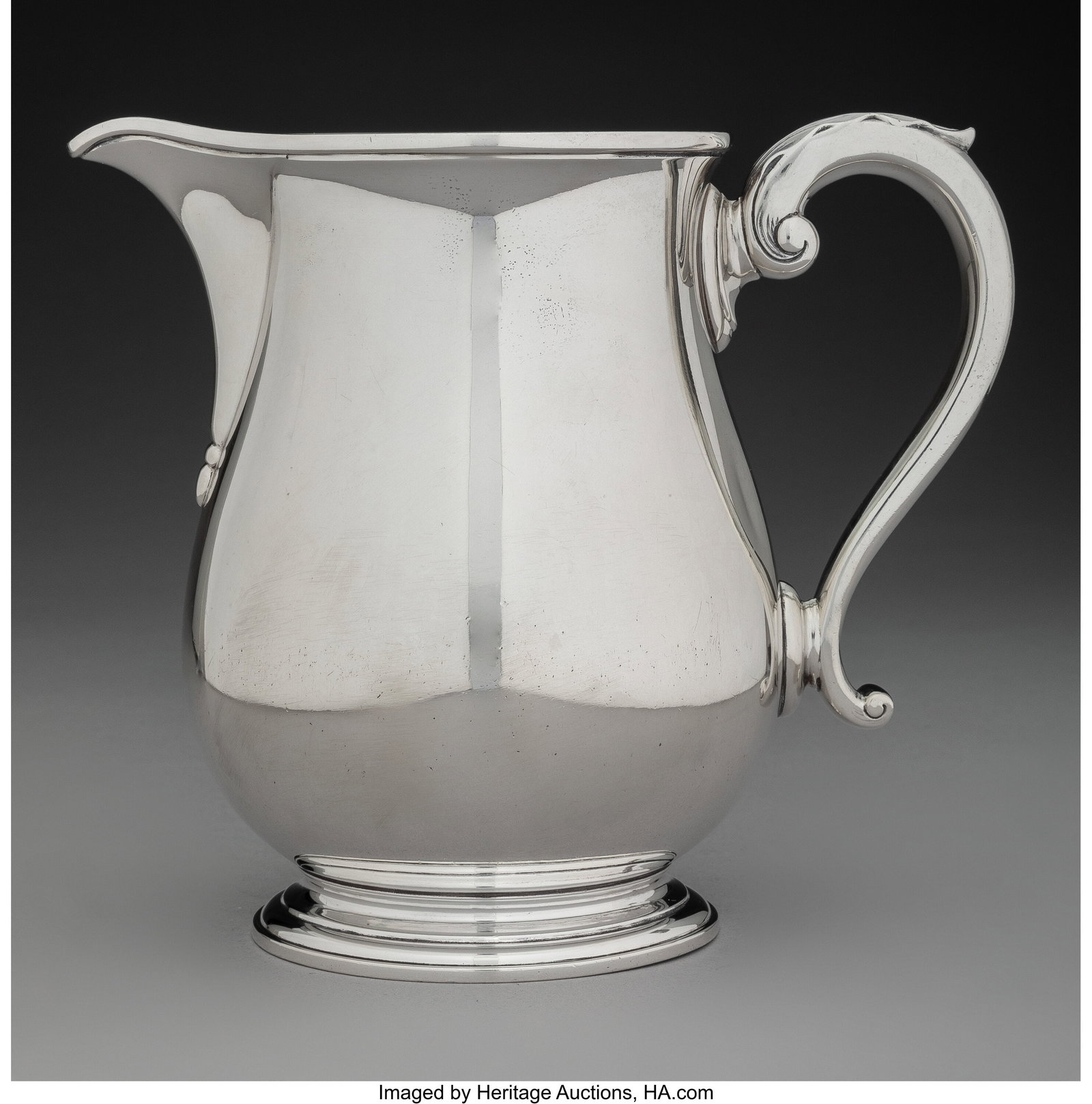 A Tiffany & Co. Silver Pitcher, New York, 1931-1: A Tiffany & Co. Silver Pitcher, New York, 1931-1947 Marks: TIFFANY & Co., 21806 MAKERS 11336, STERLING SILVER, 925-1000, M, 2 PINT