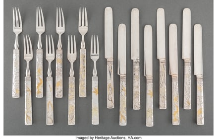 A Sixteen-Piece Tiffany & Co. Partial Gilt, Acid-Etched, Hand-Hammered Silver Flatware Dessert Servi
